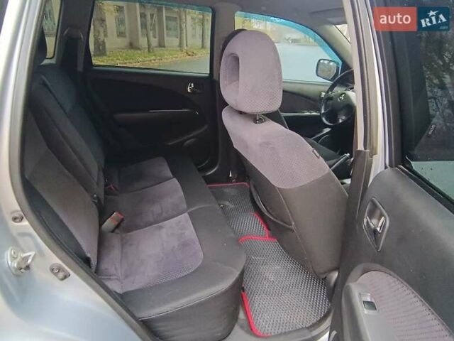 Серый Мицубиси Аутлендер, объемом двигателя 2.38 л и пробегом 266 тыс. км за 6399 $, фото 20 на Automoto.ua