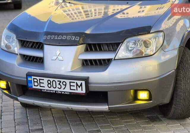 Сірий Міцубісі Аутлендер, об'ємом двигуна 2.4 л та пробігом 259 тис. км за 5999 $, фото 11 на Automoto.ua