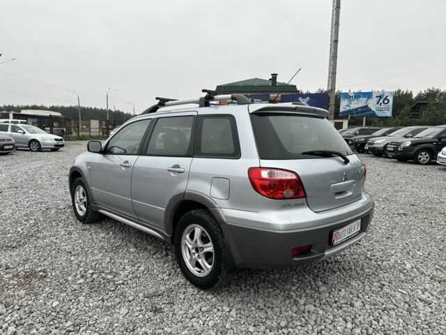 Серый Мицубиси Аутлендер, объемом двигателя 2.4 л и пробегом 260 тыс. км за 5750 $, фото 5 на Automoto.ua