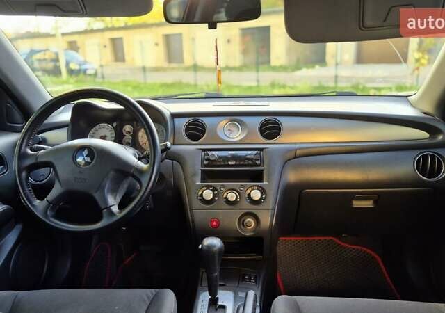 Сірий Міцубісі Аутлендер, об'ємом двигуна 2.4 л та пробігом 259 тис. км за 5999 $, фото 22 на Automoto.ua