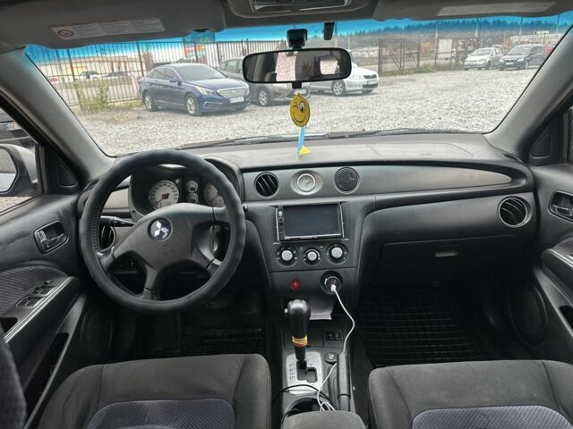 Серый Мицубиси Аутлендер, объемом двигателя 2.4 л и пробегом 260 тыс. км за 5750 $, фото 7 на Automoto.ua