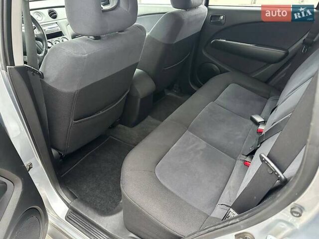 Серый Мицубиси Аутлендер, объемом двигателя 2 л и пробегом 236 тыс. км за 6600 $, фото 9 на Automoto.ua