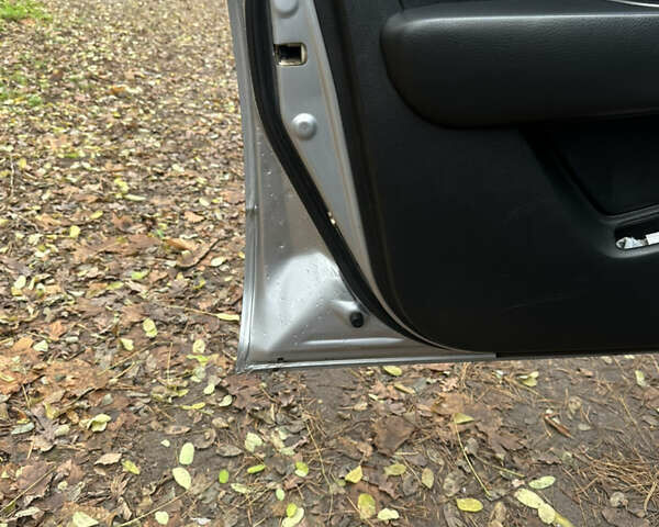 Сірий Міцубісі Аутлендер, об'ємом двигуна 2.38 л та пробігом 303 тис. км за 5200 $, фото 11 на Automoto.ua