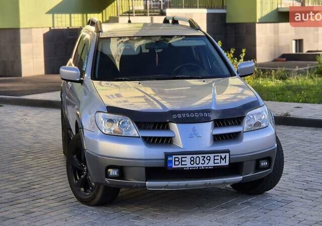 Сірий Міцубісі Аутлендер, об'ємом двигуна 2.4 л та пробігом 259 тис. км за 5999 $, фото 6 на Automoto.ua