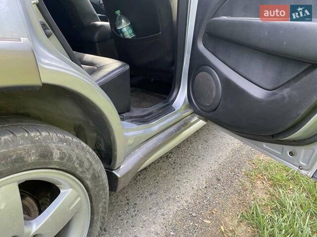 Сірий Міцубісі Аутлендер, об'ємом двигуна 2.38 л та пробігом 232 тис. км за 6000 $, фото 26 на Automoto.ua
