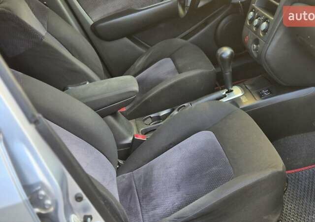 Сірий Міцубісі Аутлендер, об'ємом двигуна 2.4 л та пробігом 259 тис. км за 5999 $, фото 23 на Automoto.ua