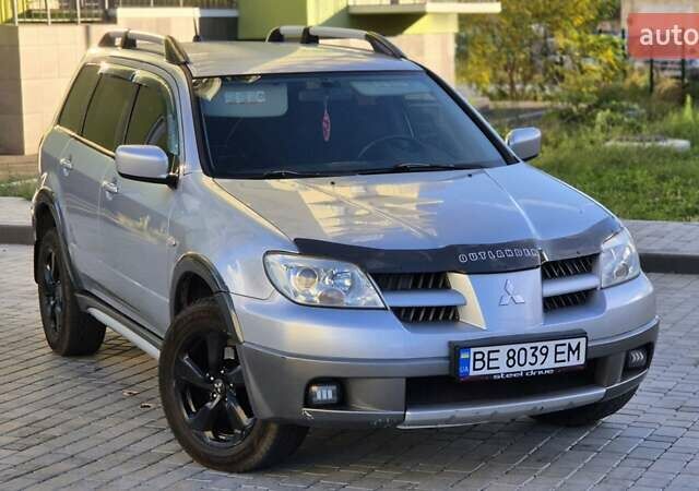 Сірий Міцубісі Аутлендер, об'ємом двигуна 2.4 л та пробігом 259 тис. км за 5999 $, фото 3 на Automoto.ua