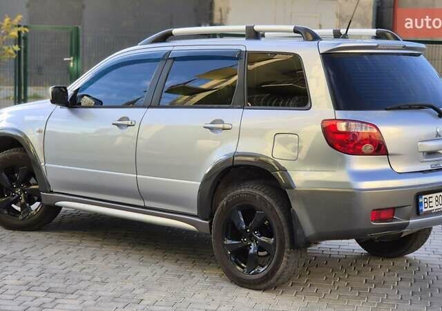 Сірий Міцубісі Аутлендер, об'ємом двигуна 2.4 л та пробігом 259 тис. км за 5999 $, фото 18 на Automoto.ua