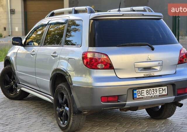 Сірий Міцубісі Аутлендер, об'ємом двигуна 2.4 л та пробігом 259 тис. км за 5999 $, фото 14 на Automoto.ua
