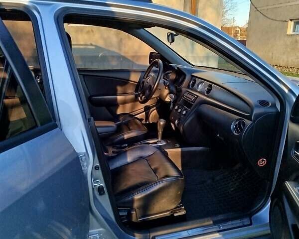 Серый Мицубиси Аутлендер, объемом двигателя 2.38 л и пробегом 295 тыс. км за 5500 $, фото 1 на Automoto.ua