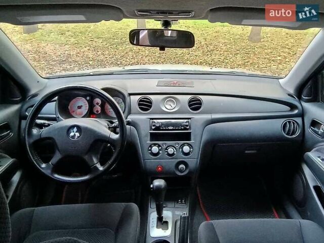 Серый Мицубиси Аутлендер, объемом двигателя 2.38 л и пробегом 266 тыс. км за 6399 $, фото 10 на Automoto.ua