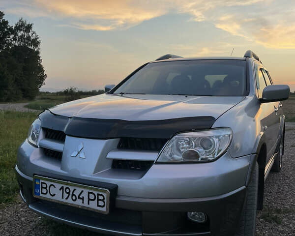 Сірий Міцубісі Аутлендер, об'ємом двигуна 2 л та пробігом 371 тис. км за 6850 $, фото 6 на Automoto.ua