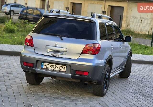 Сірий Міцубісі Аутлендер, об'ємом двигуна 2.4 л та пробігом 259 тис. км за 5999 $, фото 15 на Automoto.ua