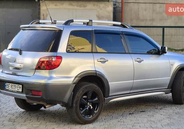 Сірий Міцубісі Аутлендер, об'ємом двигуна 2.4 л та пробігом 259 тис. км за 5999 $, фото 4 на Automoto.ua