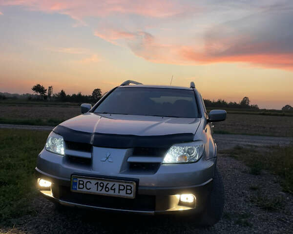 Сірий Міцубісі Аутлендер, об'ємом двигуна 2 л та пробігом 371 тис. км за 6850 $, фото 21 на Automoto.ua