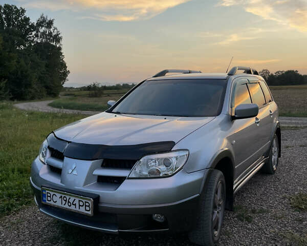 Сірий Міцубісі Аутлендер, об'ємом двигуна 2 л та пробігом 371 тис. км за 6850 $, фото 5 на Automoto.ua