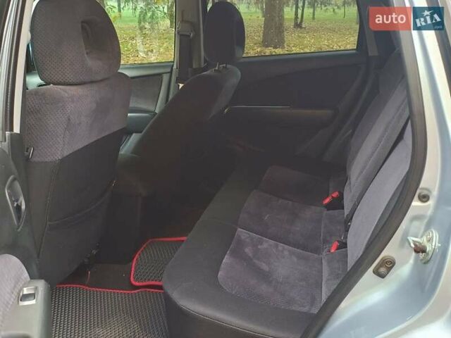 Серый Мицубиси Аутлендер, объемом двигателя 2.38 л и пробегом 266 тыс. км за 6399 $, фото 19 на Automoto.ua