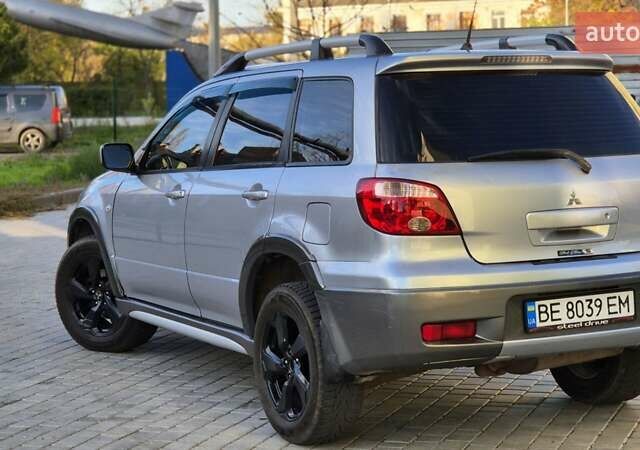 Сірий Міцубісі Аутлендер, об'ємом двигуна 2.4 л та пробігом 259 тис. км за 5999 $, фото 10 на Automoto.ua
