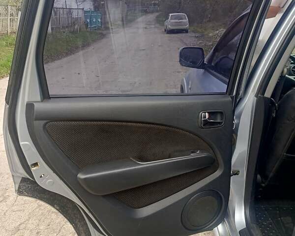 Сірий Міцубісі Аутлендер, об'ємом двигуна 2 л та пробігом 230 тис. км за 5200 $, фото 13 на Automoto.ua