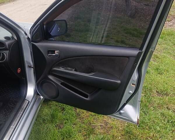 Сірий Міцубісі Аутлендер, об'ємом двигуна 2 л та пробігом 230 тис. км за 5200 $, фото 10 на Automoto.ua