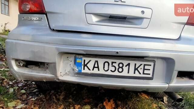 Міцубісі Аутлендер 2005 у Хмельницькому на Automoto.ua Сірий Міцубісі Аутлендер, об'ємом двигуна 2.38 л та пробігом 247 тис. км за 6200 $, фото 1 на Automoto.ua