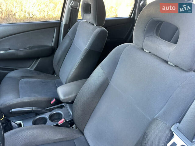 Серый Мицубиси Аутлендер, объемом двигателя 2 л и пробегом 220 тыс. км за 4550 $, фото 21 на Automoto.ua