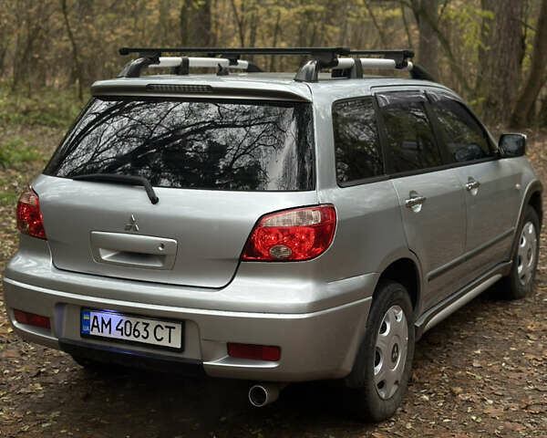 Сірий Міцубісі Аутлендер, об'ємом двигуна 2.38 л та пробігом 303 тис. км за 5200 $, фото 4 на Automoto.ua