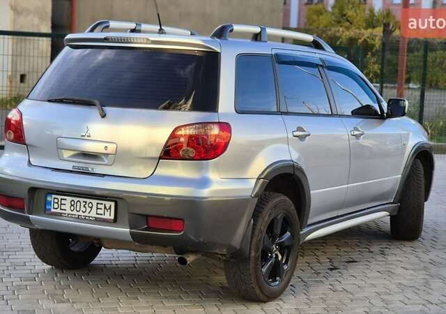 Сірий Міцубісі Аутлендер, об'ємом двигуна 2.4 л та пробігом 259 тис. км за 5999 $, фото 7 на Automoto.ua
