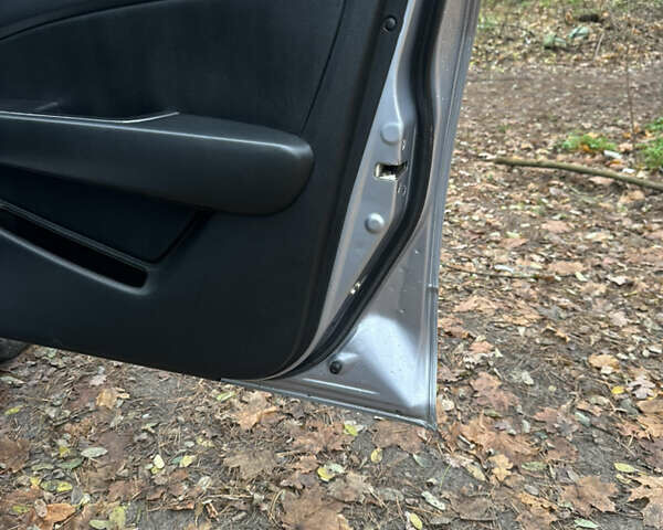 Сірий Міцубісі Аутлендер, об'ємом двигуна 2.38 л та пробігом 303 тис. км за 5200 $, фото 12 на Automoto.ua