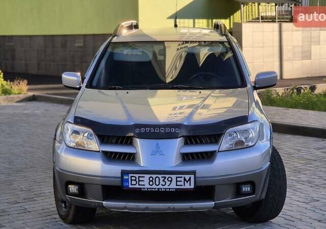 Сірий Міцубісі Аутлендер, об'ємом двигуна 2.4 л та пробігом 259 тис. км за 5999 $, фото 8 на Automoto.ua