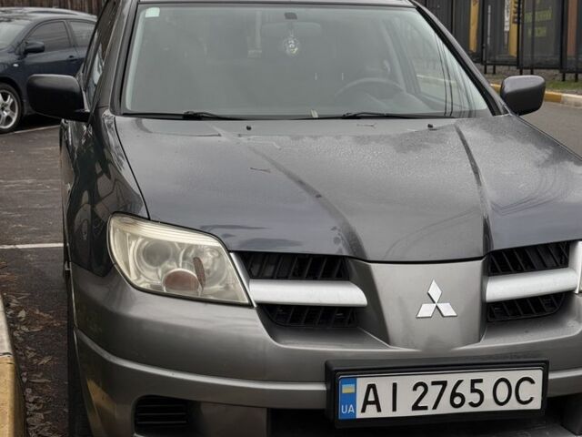 Сірий Міцубісі Аутлендер, об'ємом двигуна 2 л та пробігом 310 тис. км за 5200 $, фото 2 на Automoto.ua