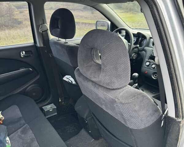 Серый Мицубиси Аутлендер, объемом двигателя 2 л и пробегом 288 тыс. км за 4300 $, фото 2 на Automoto.ua