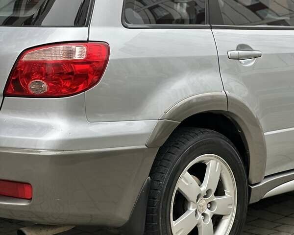 Сірий Міцубісі Аутлендер, об'ємом двигуна 2.4 л та пробігом 98 тис. км за 7199 $, фото 49 на Automoto.ua