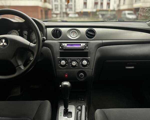 Сірий Міцубісі Аутлендер, об'ємом двигуна 2.4 л та пробігом 98 тис. км за 7199 $, фото 66 на Automoto.ua