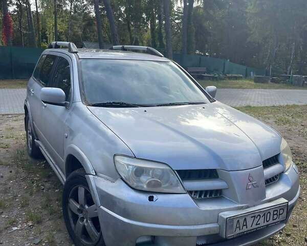 Серый Мицубиси Аутлендер, объемом двигателя 2.4 л и пробегом 127 тыс. км за 4400 $, фото 12 на Automoto.ua