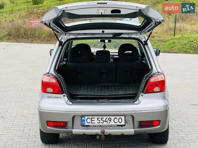 Сірий Міцубісі Аутлендер, об'ємом двигуна 2 л та пробігом 300 тис. км за 5150 $, фото 21 на Automoto.ua