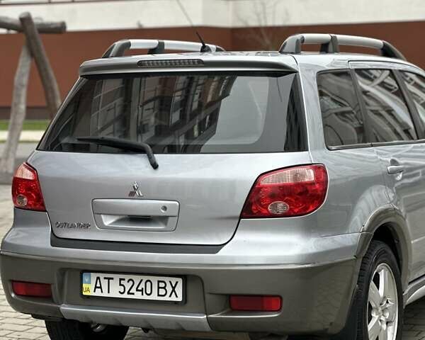 Сірий Міцубісі Аутлендер, об'ємом двигуна 2.4 л та пробігом 98 тис. км за 7199 $, фото 43 на Automoto.ua