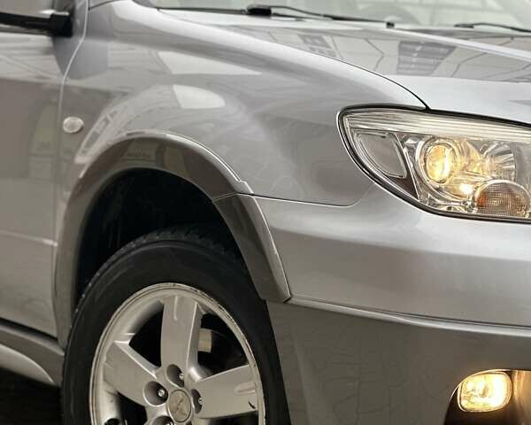 Сірий Міцубісі Аутлендер, об'ємом двигуна 2.4 л та пробігом 98 тис. км за 7199 $, фото 28 на Automoto.ua