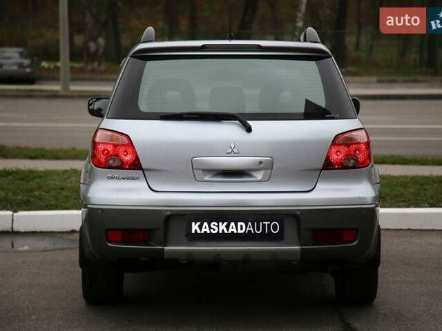Серый Мицубиси Аутлендер, объемом двигателя 2.4 л и пробегом 171 тыс. км за 8200 $, фото 4 на Automoto.ua