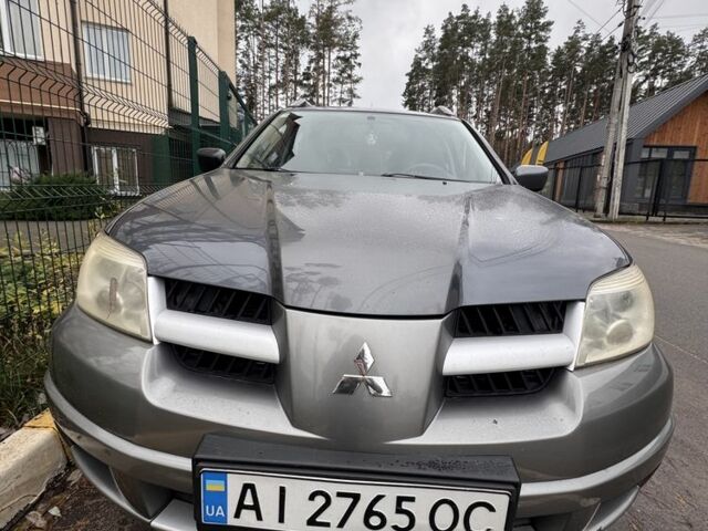 Сірий Міцубісі Аутлендер, об'ємом двигуна 2 л та пробігом 310 тис. км за 5200 $, фото 3 на Automoto.ua