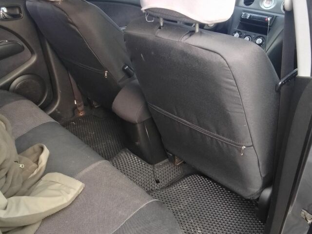 Серый Мицубиси Аутлендер, объемом двигателя 2 л и пробегом 154 тыс. км за 6500 $, фото 12 на Automoto.ua