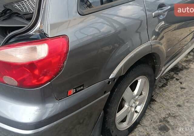 Серый Мицубиси Аутлендер, объемом двигателя 2.38 л и пробегом 600 тыс. км за 5700 $, фото 10 на Automoto.ua