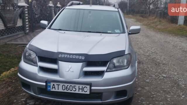 Серый Мицубиси Аутлендер, объемом двигателя 2.4 л и пробегом 261 тыс. км за 5700 $, фото 7 на Automoto.ua