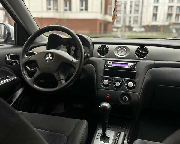 Сірий Міцубісі Аутлендер, об'ємом двигуна 2.4 л та пробігом 98 тис. км за 7199 $, фото 64 на Automoto.ua