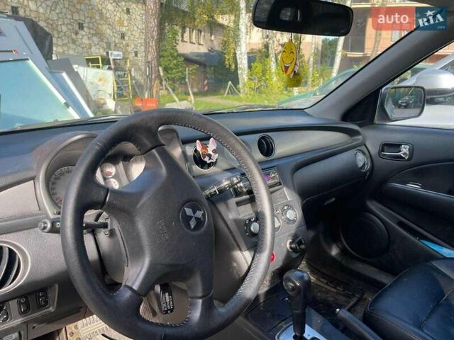 Серый Мицубиси Аутлендер, объемом двигателя 2.4 л и пробегом 127 тыс. км за 4400 $, фото 4 на Automoto.ua