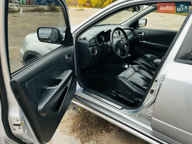 Серый Мицубиси Аутлендер, объемом двигателя 2.4 л и пробегом 264 тыс. км за 6300 $, фото 10 на Automoto.ua