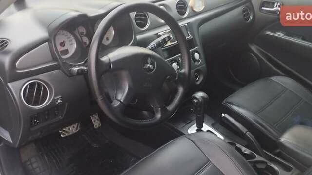 Серый Мицубиси Аутлендер, объемом двигателя 2.4 л и пробегом 261 тыс. км за 5700 $, фото 35 на Automoto.ua