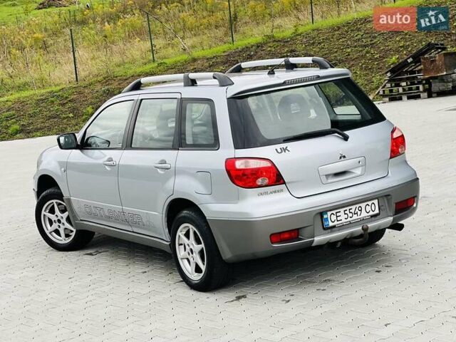 Сірий Міцубісі Аутлендер, об'ємом двигуна 2 л та пробігом 300 тис. км за 5150 $, фото 3 на Automoto.ua