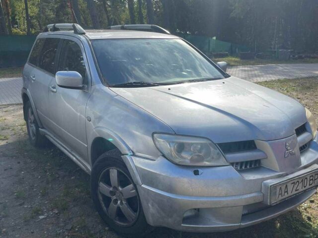 Серый Мицубиси Аутлендер, объемом двигателя 2.4 л и пробегом 127 тыс. км за 4400 $, фото 2 на Automoto.ua