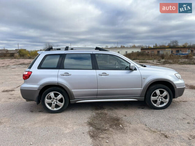 Серый Мицубиси Аутлендер, объемом двигателя 2.4 л и пробегом 264 тыс. км за 6300 $, фото 7 на Automoto.ua